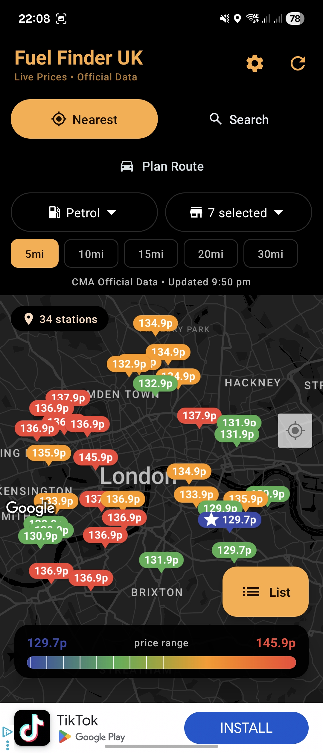 Fuel Finder UK AMOLED dark orange theme showing live petrol prices — deep black background saves battery on OLED screens